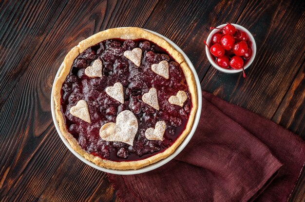 St. Valentine's day cherry jam tart flat lay