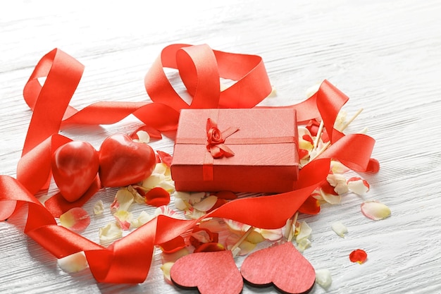 St Valentines Day concept Gift box and decorations on white wooden table