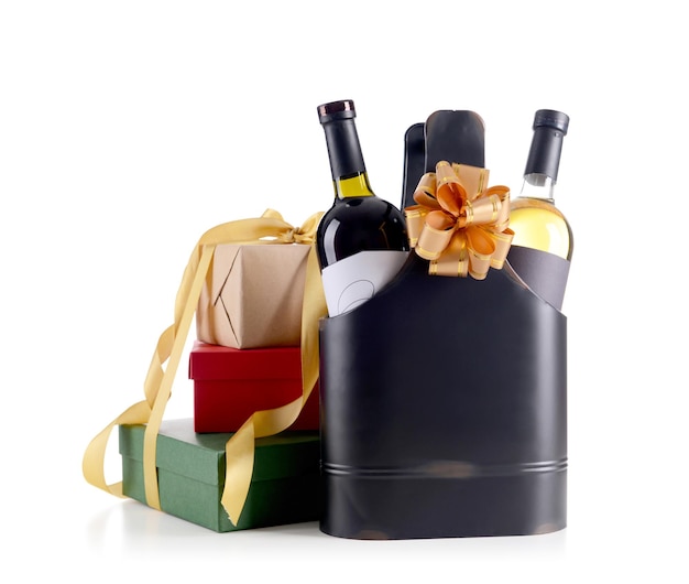 St Valentines Day concept Luxury leather bag with wine bottles and gift boxes isolated on white