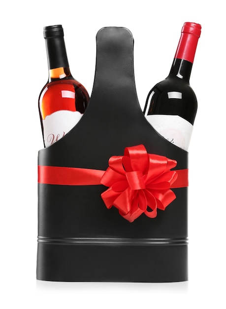 聖バレンタインデーのコンセプト。白で隔離のワインボトルと豪華な革のバッグ