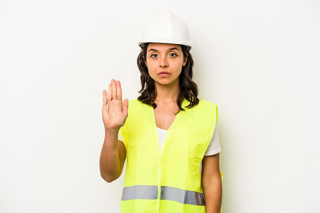 Foto staande met uitgestrekte hand met stopbord dat je verhindert