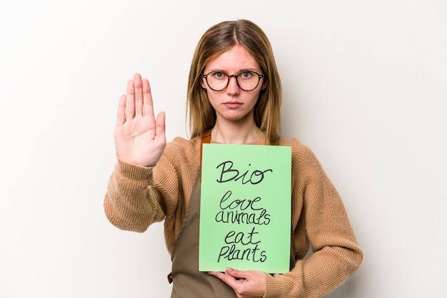 Foto staande met uitgestrekte hand met stopbord dat je verhindert