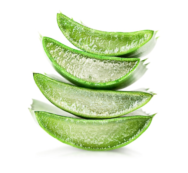 Stack of aloe vera slices on white isolated background