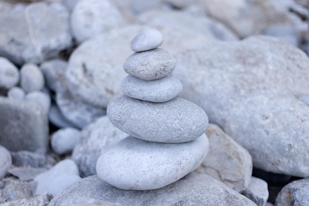 Stack balancing pebble stones pool with out