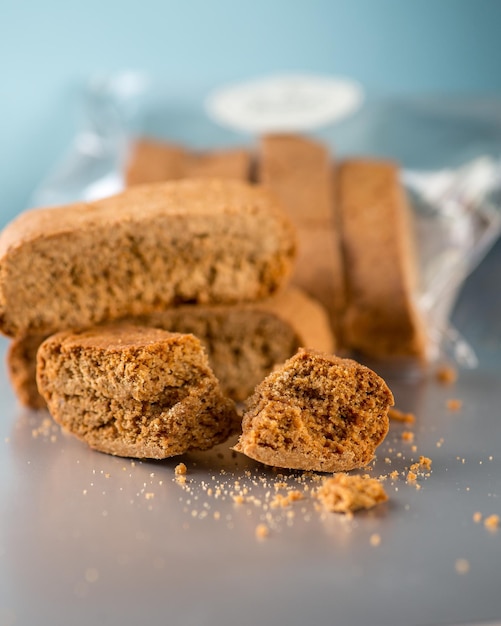 Stack of Biscotti cookies on the light background