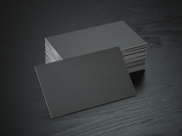 Stack of black blank business cards mockup on black wood table background