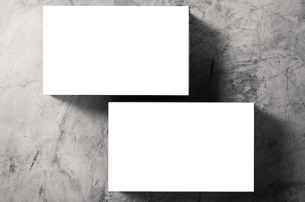 Stack of blank name cards on grey background