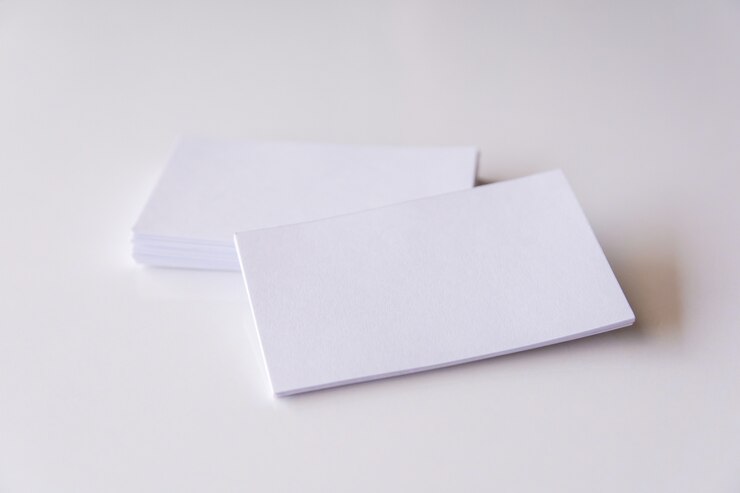 Photo stack of blank white business cards. mockup business cards on white background 