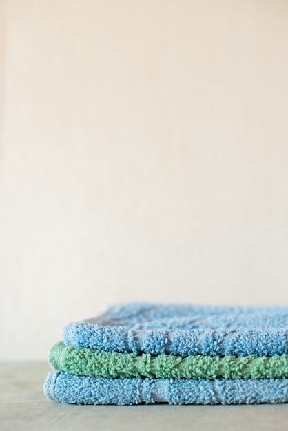 Stack of blue and green towels