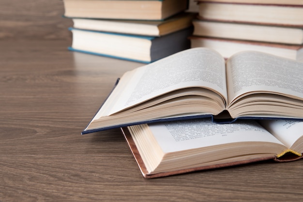 stack book on wooden background