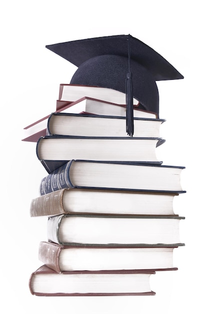 Photo stack of books against white background