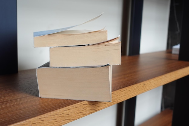 Stack of books in a book shelf