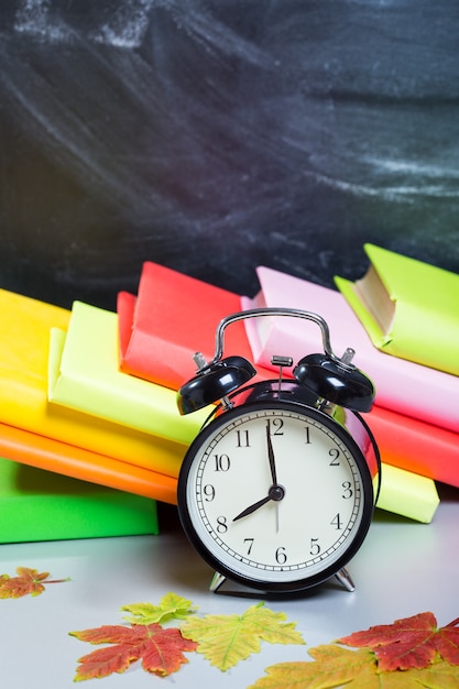 Photo stack of books on a desk for back to school