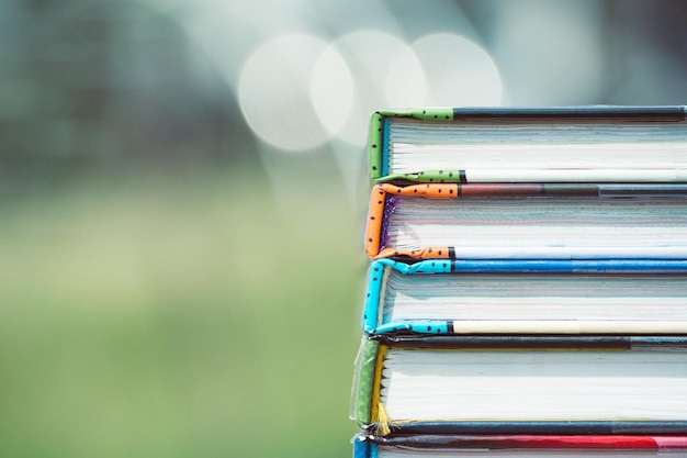 Photo stack of books outdoors