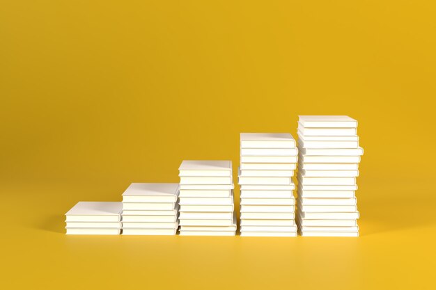 Stack of books shaped stairs on yellow background