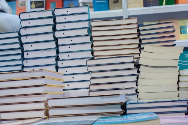 Stack of books stored as Education and business concept