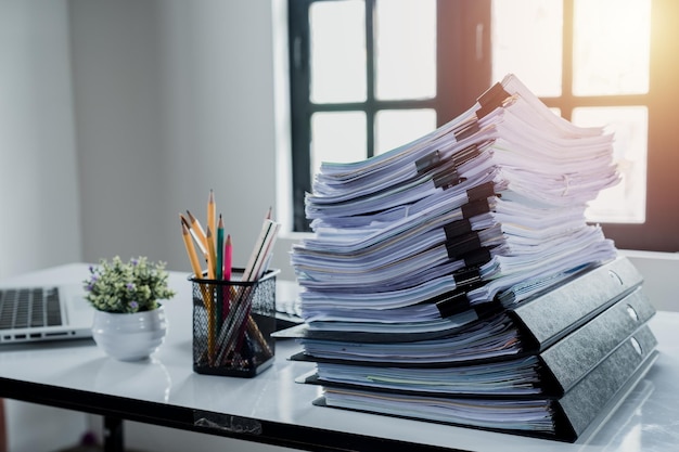 Photo stack of books on table at home