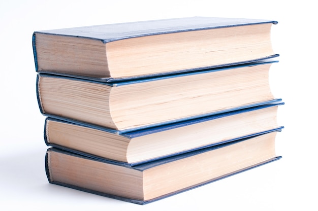 A stack of books on a white background.