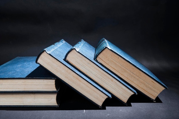 Stack of books with dark background