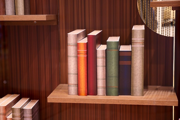 Stack of books on wooden table