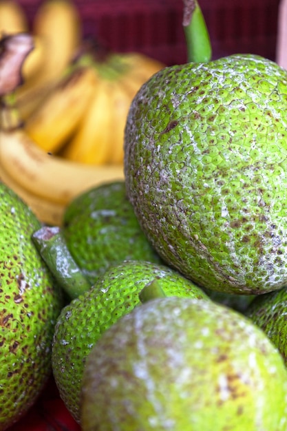 Stack of Breadfruits on a market stall