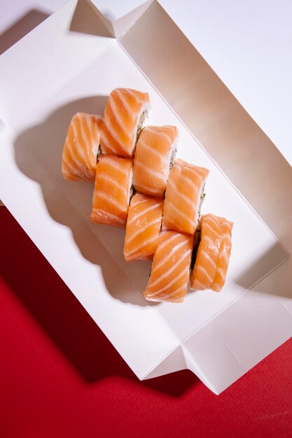 A stack of candy in a white container