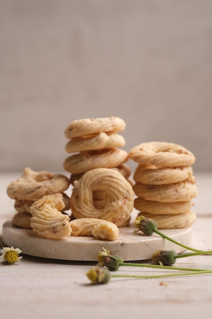 Stack of cheese sago. eid cookies made from sago flour, cheese,\
and eggs. kue sagu keju. kue kering