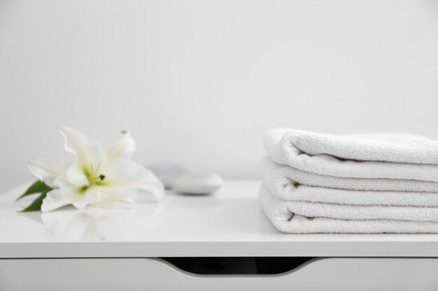 Stack of clean towels on table