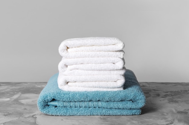 Stack of clean towels on table