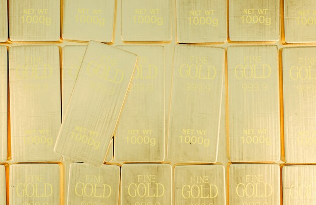 Stack close-up Gold Bars weight of 1000 grams.,Concept of success in business and finance.,3d model and illustration.