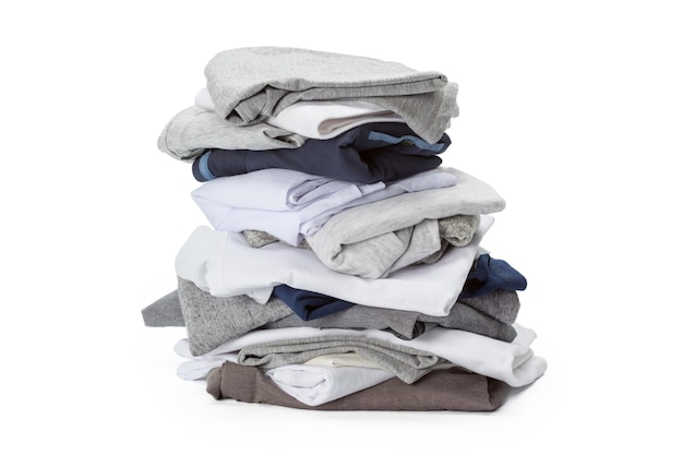 Stack of clothes on white background closeup