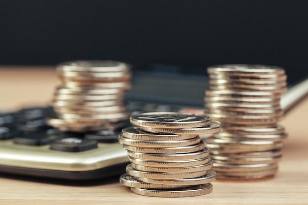 stack of coins and calculator,concept idea for business finance