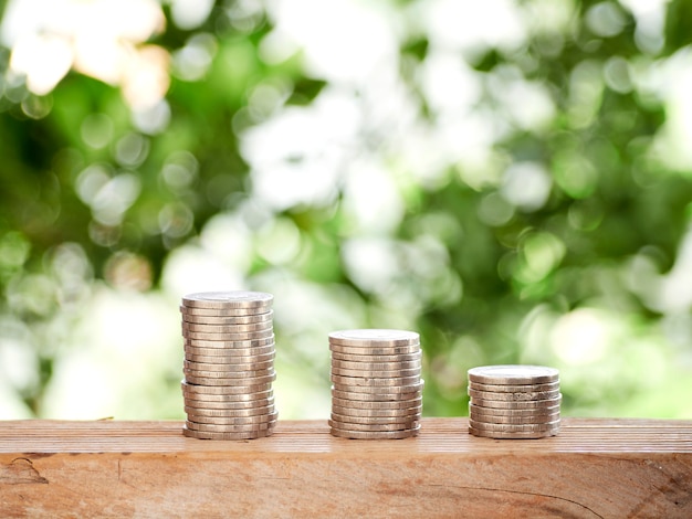 Stack Of Coins On Table Outdoors