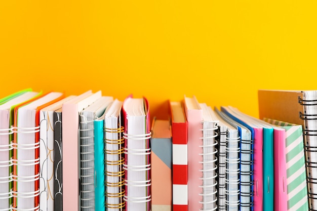 Photo stack of colorful books against table