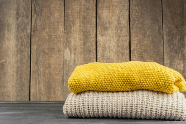 Stack of cozy knitted sweaters