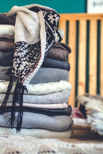 A stack of cozy warm winter clothes