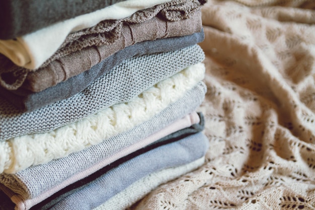 A stack of cozy warm winter clothes