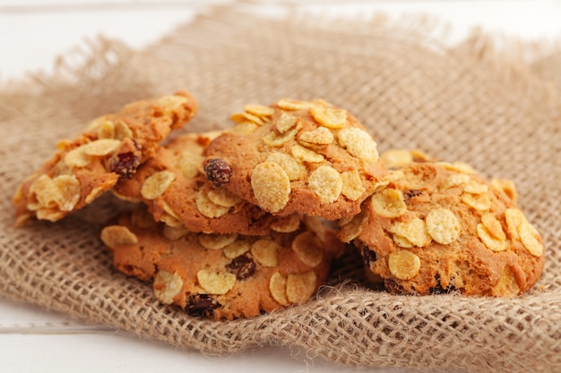 Stack of crunchy tasty cookies on a kitchen table close up