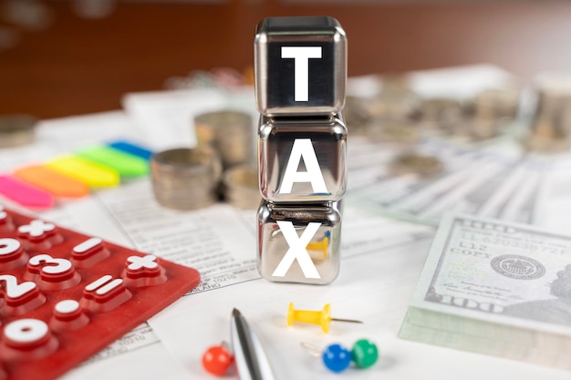 A stack of cubes with the word tax written on them