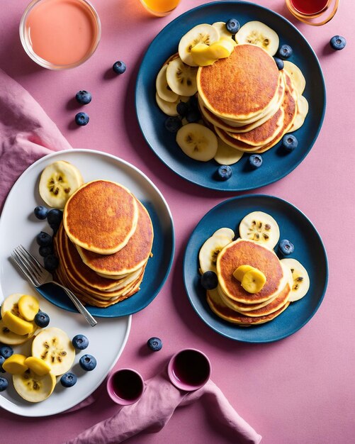 stack of delicious pancakes with berries and blueberries on white plate on blue background