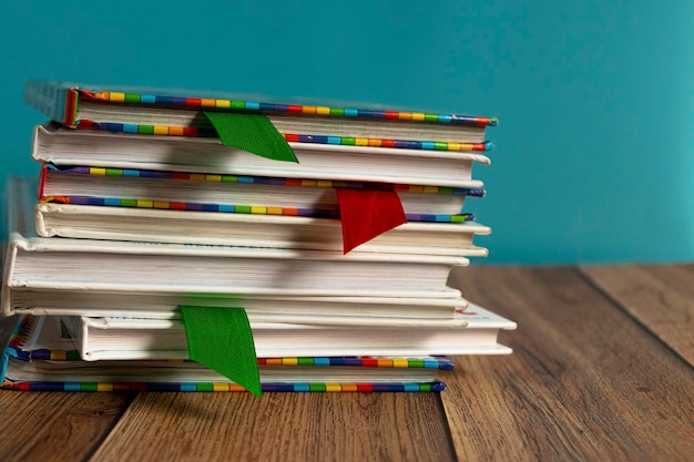 A stack of different bookmarks with bookmarks for pages Book binding Knowledge and education Books for children School library