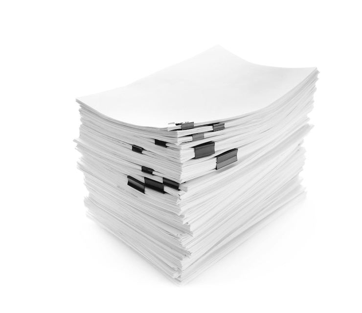 Photo stack of documents with black clips on white background