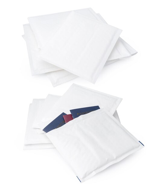 Stack of envelopes on white background