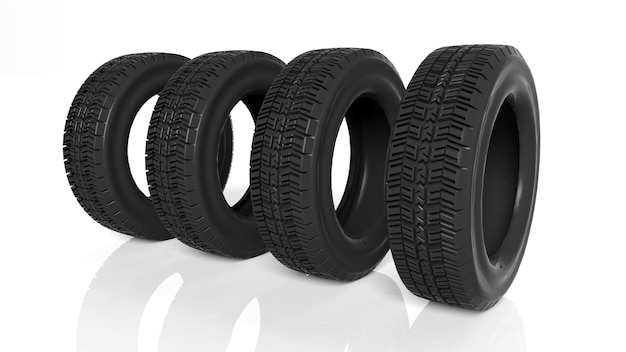 Stack of four black tires isolated on white background