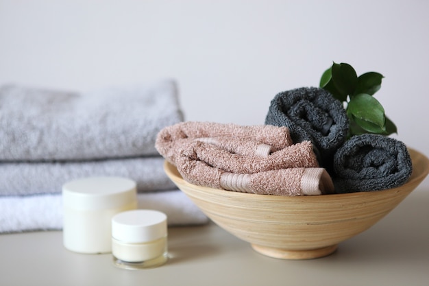 A stack of fresh towels on the table