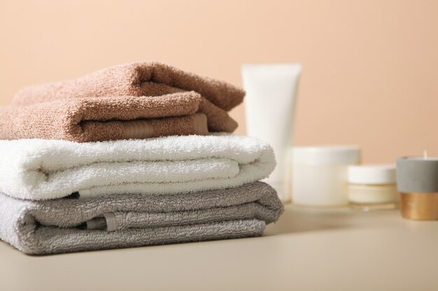 A stack of fresh towels on the table