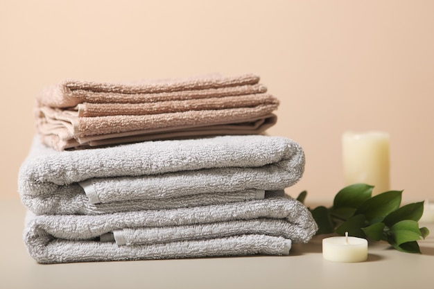 A stack of fresh towels on the table