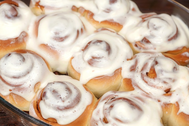 Stack of freshly cinnabon, French buns with cinnamon and cream