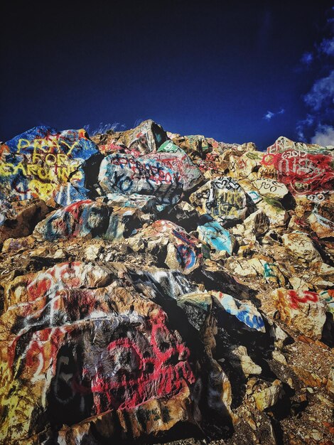 Photo stack of garbage against blue sky