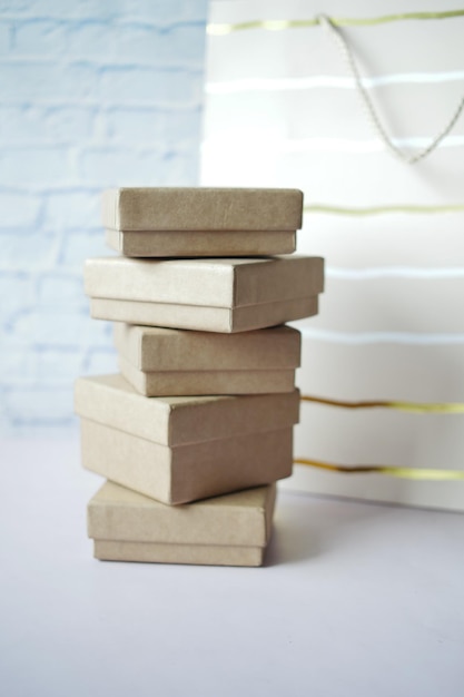 Stack of gift box and a bag on table